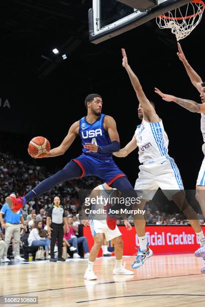 Tyrese Haliburton of the USA Senior Men's National Team drives to the basket and passes the ball during the game against Greece as part of 2023 FIBA...