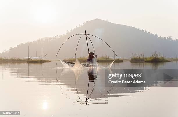 fishing, loktak lake, near imphal, manipur, india - asian fishing boat stock-fotos und bilder