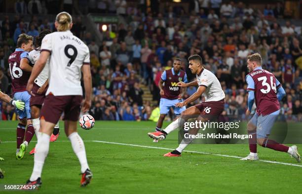 Rodri of Manchester City scores the team's third goal during the Premier League match between Burnley FC and Manchester City at Turf Moor on August...