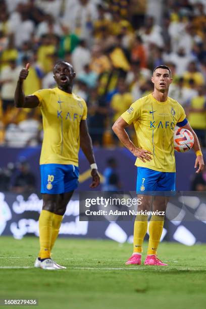 Sadio Mane from Al Nassr FC and Cristiano Ronaldo dos Santos Aveiro from Al Nassr FC during the Saudi Pro League football match between Al-Nassr and...