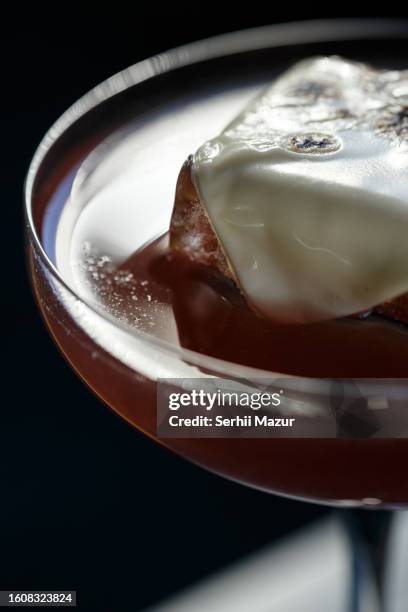 red cocktail with amazing decoration - stock photo - tangerine martini stock pictures, royalty-free photos & images