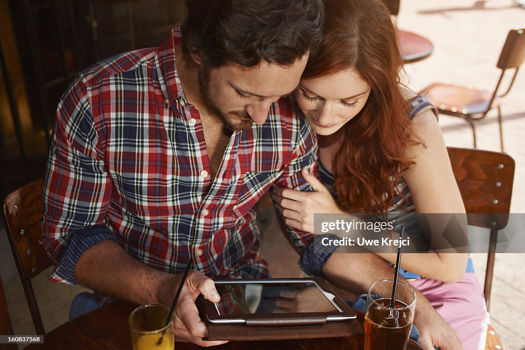 Couple sitting at a restaurant table