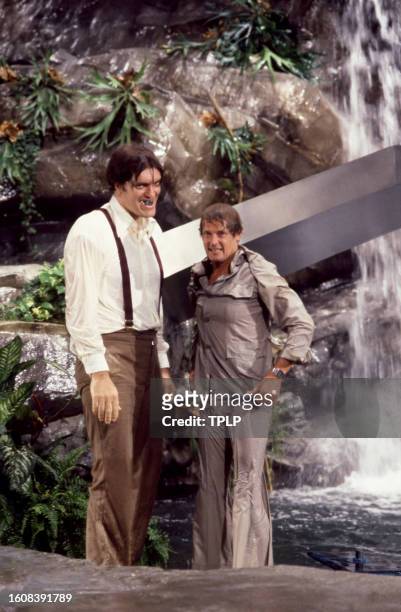 American actor Richard Kiel, is Jaws, and English actor Roger Moore , is James Bond, during the filming of the 1979 James Bond spy movie, Moonraker...