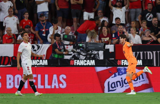 Javi Guerra of Valencia celebrates after scoring the team's second goal during the LaLiga EA Sports match between Sevilla FC and Valencia CF at on...