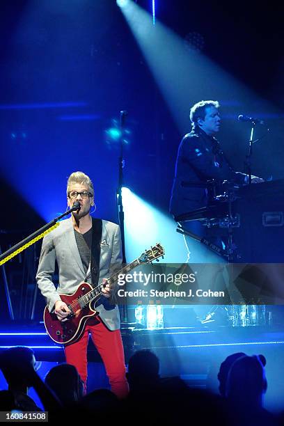 Kyle Cook and Paul Doucette of Matchbox Twenty performs at the Louisville Palace on February 5, 2013 in Louisville, Kentucky.