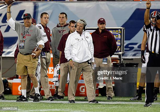 Head coach Frank Beamer of the Virginia Tech Hokies directs his team against the Rutgers Scarlet Knights during the Russell Athletic Bowl Game at the...