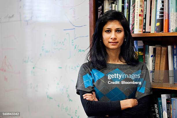 Gita Gopinath, professor of economics at Harvard University, poses for a portrait in her office on campus in Cambridge, Massachusetts, U.S., on...