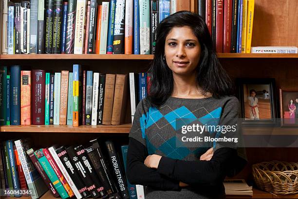 Gita Gopinath, professor of economics at Harvard University, poses for a portrait in her office on campus in Cambridge, Massachusetts, U.S., on...