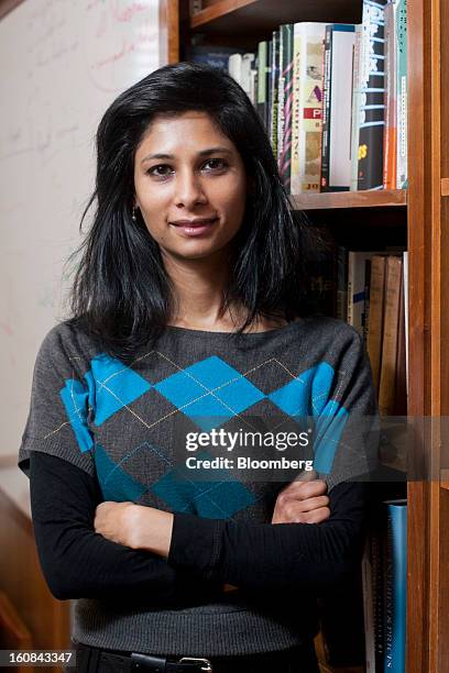Gita Gopinath, professor of economics at Harvard University, poses for a portrait in her office on campus in Cambridge, Massachusetts, U.S., on...