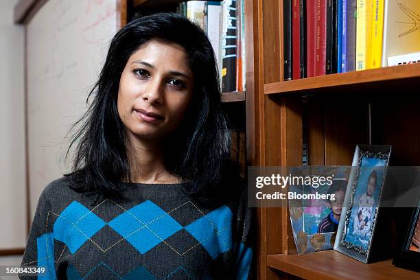 Gita Gopinath, professor of economics at Harvard University, poses for a portrait in her office on campus in Cambridge, Massachusetts, U.S., on...