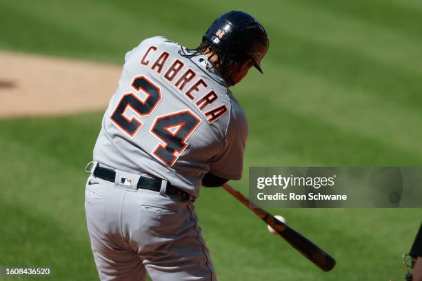 Miguel Cabrera of the Detroit Tigers hits an RBI double off Gavin Williams of the Cleveland Guardians during the first inning of game one of a...