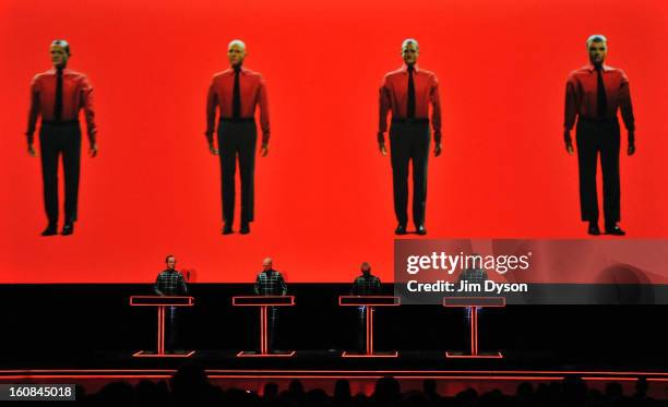 Ralf Hutter, Henning Schmitz, Fritz Hilpert and Falk Grieffenhagen, of German electronic pioneers Kraftwerk, perform live on stage during the first...