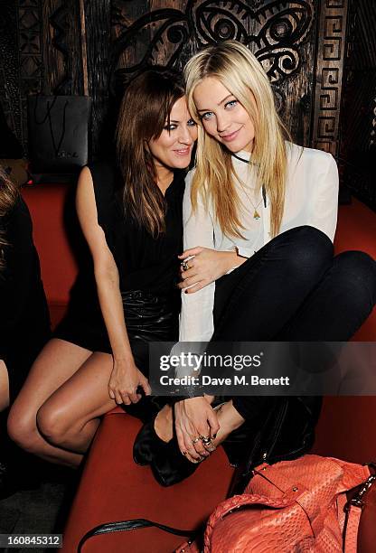 Caroline Flack and Laura Whitmore attend the Rita Ora aftershow party with Red Bull Editions at Mahiki London on February 6, 2013 in London, England.