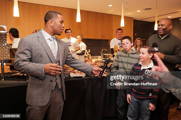 Superbowl champion Baltimore Raven Ray Rice chats with military members and their families at the launch event for Jeep Operation Safe Return at the...