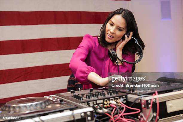 Actress Olivia Munn entertains military members and their families at the launch event for Jeep Operation Safe Return at the USO Warrior & Family...