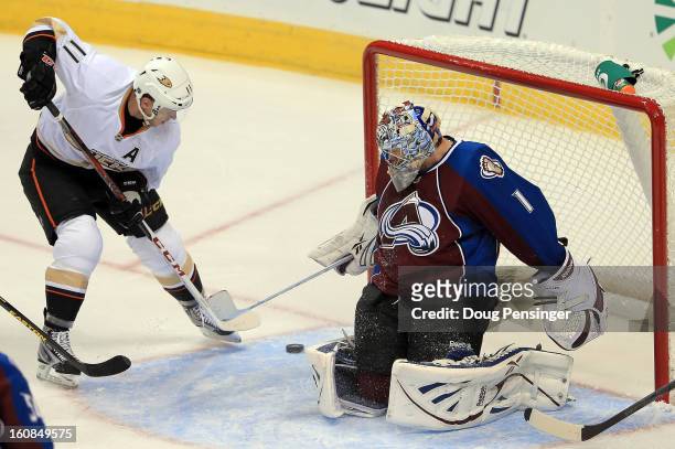 Saku Koivu of the Anaheim Ducks puts the puck past goalie Semyon Varlamov of the Colorado Avalanche to give the Ducks a 2-0 lead in the first period...