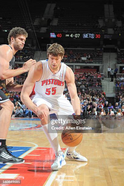 Viacheslav Kravtsov of the Detroit Pistons drives to the basket against Brook Lopez of the Brooklyn Nets on February 6, 2013 at The Palace of Auburn...