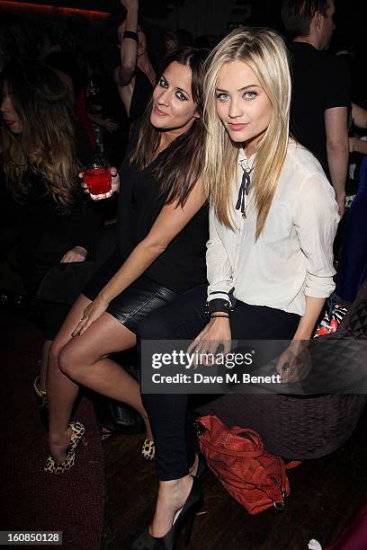 Caroline Flack and Laura Whitmore attend the 2nd Anniversary of The Box with Belvedere Vodka on February 6, 2013 in London, England.