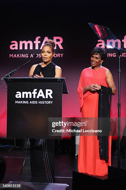 Janet Jackson and Maria Davis speak onstage at the amfAR New York Gala to kick off Fall 2013 Fashion Week at Cipriani Wall Street on February 6, 2013...