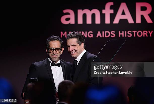 Designer Kenneth Cole and New York governer Andrew Cuomo attend the amfAR New York Gala to kick off Fall 2013 Fashion Week at Cipriani Wall Street on...