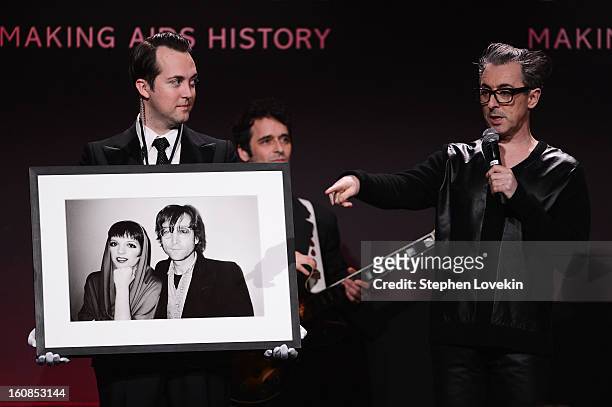Alan Cummings speaks onstage at the amfAR New York Gala to kick off Fall 2013 Fashion Week at Cipriani Wall Street on February 6, 2013 in New York...
