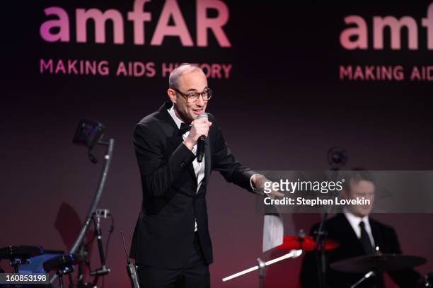 Andy Boose speaks onstage at the amfAR New York Gala to kick off Fall 2013 Fashion Week at Cipriani Wall Street on February 6, 2013 in New York City.
