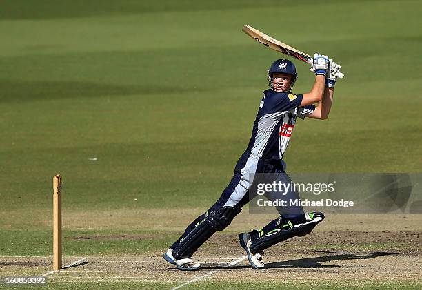 Peter Handscomb of Victoria hits the ball and the winning runs during the International tour match between the Victorian 2nd XI and the England Lions...