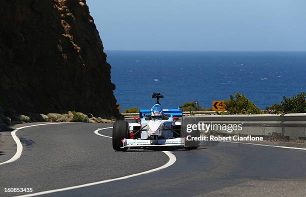 Cameron McConville drives the two seater formula one car during the filming of a Television advertisment on the Great Ocean Road on February 7, 2013...