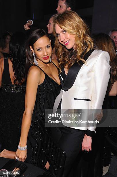 Dania Ramirez and Ofira Sandberg attend the amfAR New York Gala to kick off Fall 2013 Fashion Week at Cipriani Wall Street on February 6, 2013 in New...