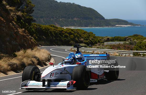 Cameron McConville drives the two seater formula one car during the filming of a Television advertisment on the Great Ocean Road on February 7, 2013...