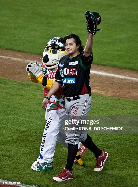 Luis Mendoza of Yaquis de Obregon of Mexico waves to the crowd after pitching against Criollos de Caguas of Puerto Rico during the 2013 Caribbean...