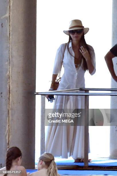 Victoria Beckham is seen arriving at restaurant Lo Scoglio on August 18, 2023 in Nerano, Italy.