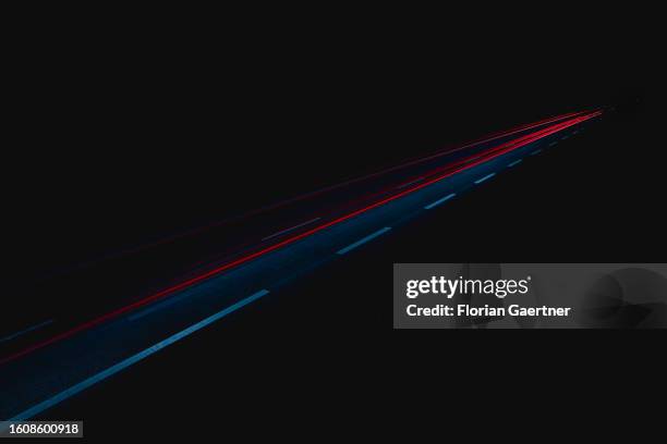 Lights of cars on the highway A4 are pictured with long exposure on August 18, 2023 in Gebelzig, Germany.