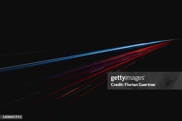 Lights of cars on the highway A4 are pictured with long exposure on August 18, 2023 in Gebelzig, Germany.