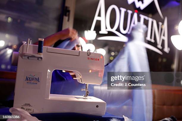 Designer Carmen Green works on her design during the Aquafina "Pure Challenge" at the Aquafina "Pure Challenge" After Party at The Empire Hotel...