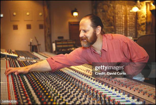 Record producer Eddie Kramer sits behond the mixing desk at Manhattan Center Studio, New York, 29 March 1994.