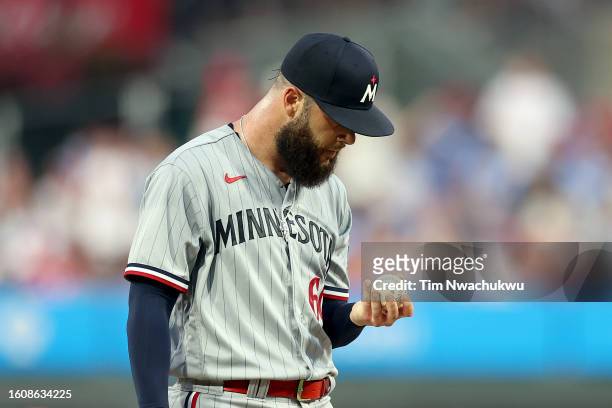 Dallas Keuchel of the Minnesota Twins reacts during the second inning against the Philadelphia Phillies at Citizens Bank Park on August 11, 2023 in...