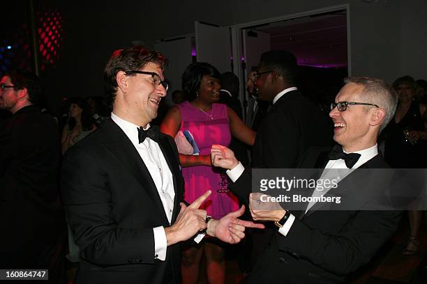 Lyndon Boozer, a lobbyist for AT&T Inc., left, talks to Bennett Rink, executive director of Alvin Ailey American Dance Theater, at the Alvin Ailey...