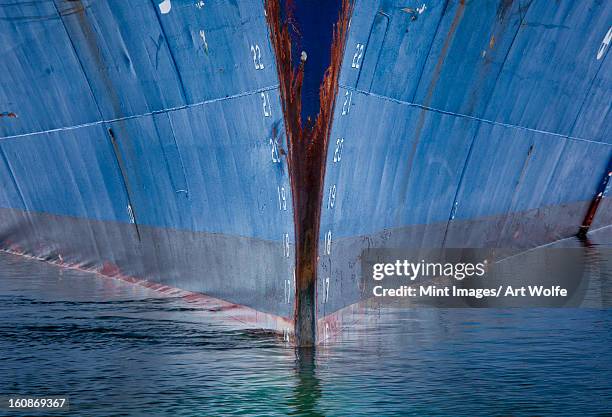 ship hull in the water, antarctica. the prow. - ice breaker stock-fotos und bilder