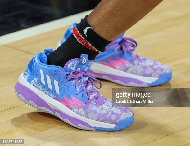 Chelsea Gray of the Las Vegas Aces wears Adidas shoes as she warms up before a game against the Washington Mystics at Michelob ULTRA Arena on August...