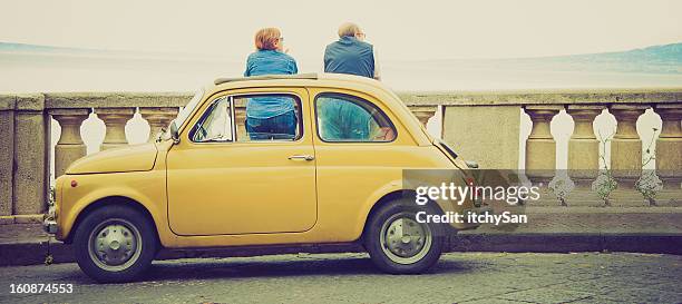 admiring the naples bay - old car side view stock pictures, royalty-free photos & images