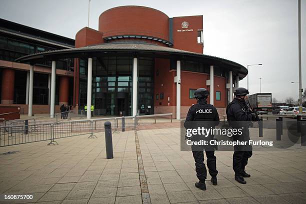 Armed police stand guard as the trial of Dale Cregan and nine other co-defendants face charges of murder and attempted murder at Preston Crown Court...