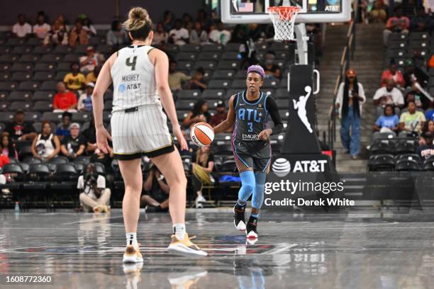 Danielle Robinson of the Atlanta Dream dribbles the ball during the game against the Chicago Sky on August 18, 2023 at Gateway Center Arena at...