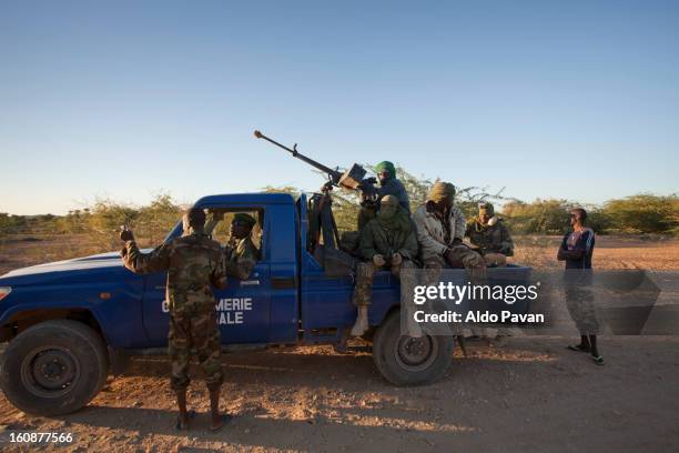 police patrolling out of the town - niger stock pictures, royalty-free photos & images