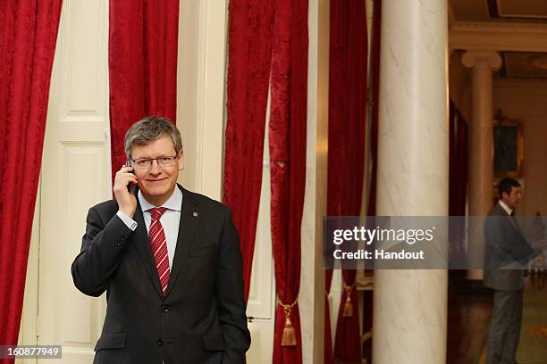 European Commissioner for Employment, Social Affairs and Inclusion, Laszlo Andor uses his mobile phone during a break of the Informal Meeting of...