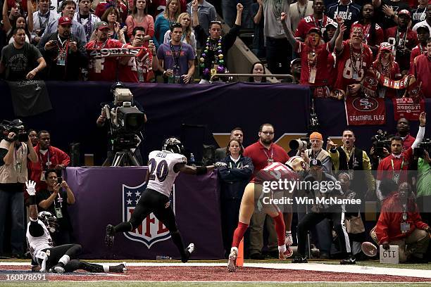 Michael Crabtree of the San Francisco 49ers can't make a catch on a fourth down play in the final two minutes of the fourth quarter against Ed Reed,...