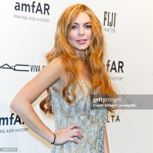 Lindsay Lohan attends amfAR New York Gala To Kick Off Fall 2013 Fashion Week at Cipriani, Wall Street on February 6, 2013 in New York City.