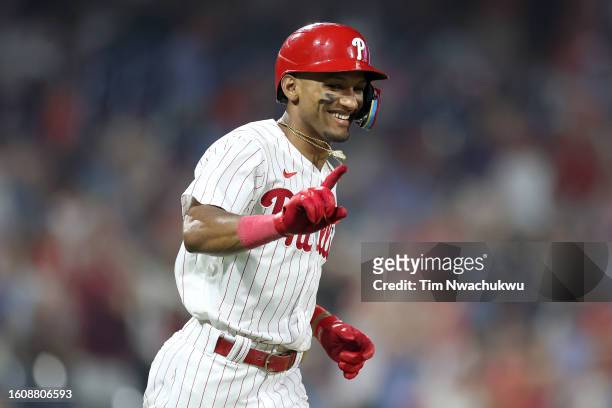 Johan Rojas of the Philadelphia Phillies rounds bases after hitting a two run home run during the eighth inning against the Minnesota Twins at...