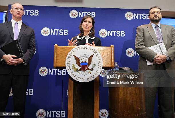 Deborah Hersman, Chairman of the National Transportation Safty Board, NTSB, speaks while flanked by John DeLisi , director of the NTSB Office of...