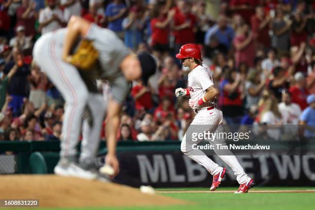 Bryson Stott of the Philadelphia Phillies rounds bases after hitting a solo home run during the sixth inning against the Minnesota Twins at Citizens...